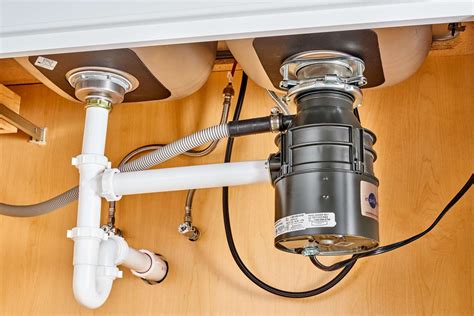 What is a Continuous Feed Garbage Disposal: A Symphony of Kitchen Chaos and Efficiency